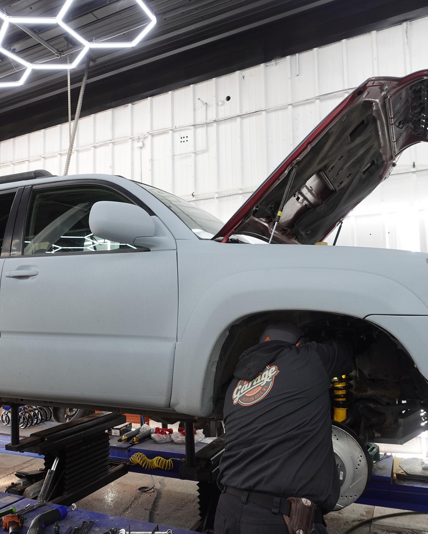 SUV suspension and brake work on the lift